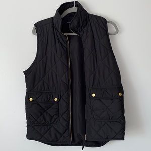 Black quilted vest